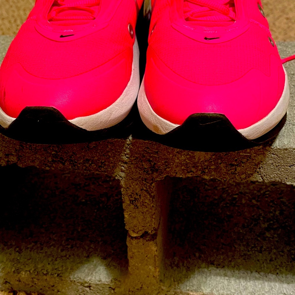 Hot pink and black Nike running shoes,worn only once